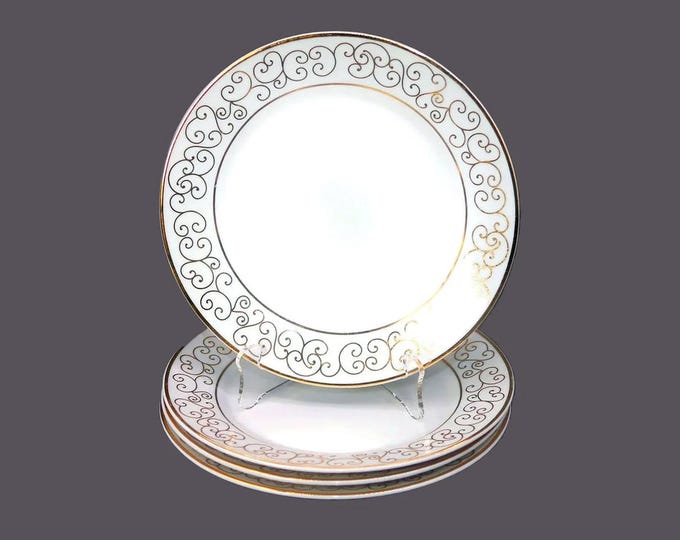 Four Holiday Joy Christmas salad or side plates.