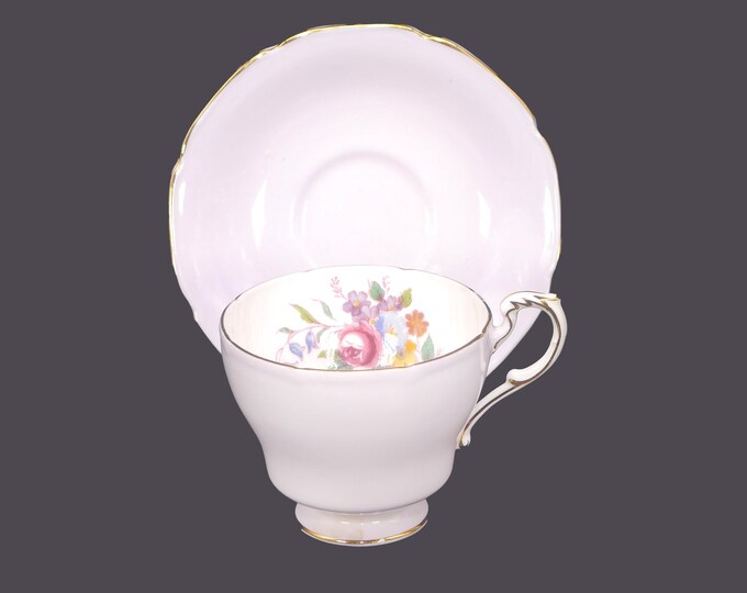 Mid-century Paragon B8131 lilac cup and saucer set. Multicolor flowers and roses. Bone china made in England.