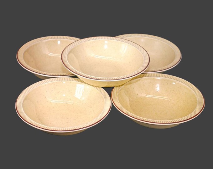 Five Poole Pottery Parkstone rimmed stoneware fruit nappies, dessert bowls made in England.