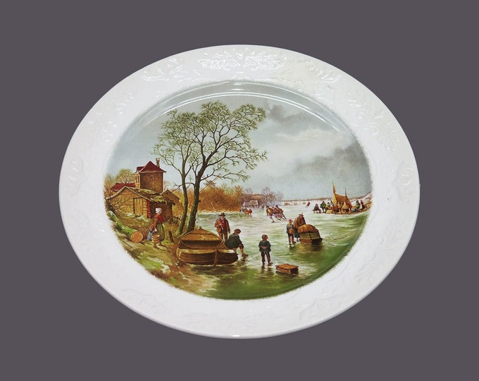 Royal Staffordshire display plate made in England. Central English village fishing scene, floral creamware rim.