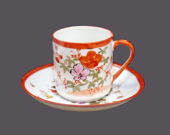 Hand-painted Nippon demitasse cup and saucer set made by Tashiro Shoten. Flowers and butterflies.