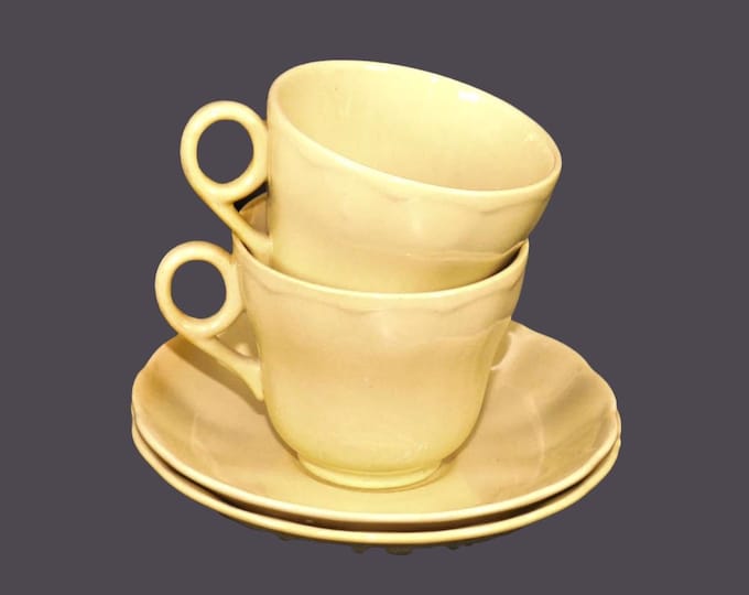 Pair of Grindley Petal Ware Yellow cup and saucer sets made in England.