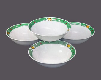 Four Gibson Designs Christmas Treasures coupe cereal bowls.