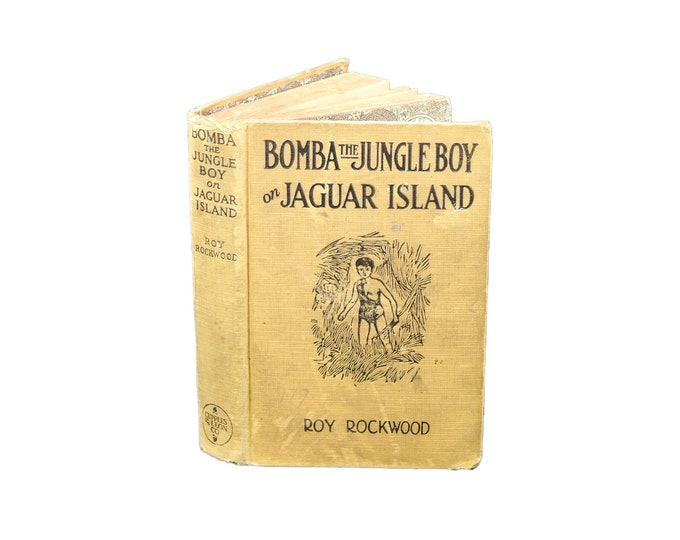 Almost antique first-edition hardcover book Bomba the Jungle Boy on Jaguar Island. Roy Rockwood. Cupples Leon New York. Complete.