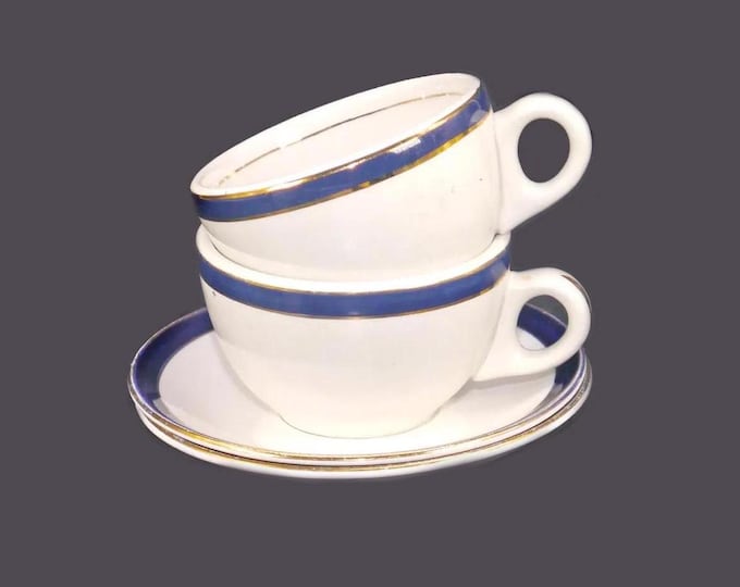 Pair of mismatched cup and saucer sets. Ridgway Potteries Bleu de Roi cups with Alfred Meakin Blue de Roi saucers.