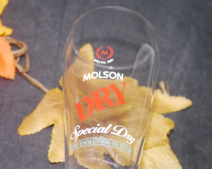 Molson's Special Dry "The Evolution of Beer" tapered half-pint pilsner glass. Etched-glass branding. Great man gift.