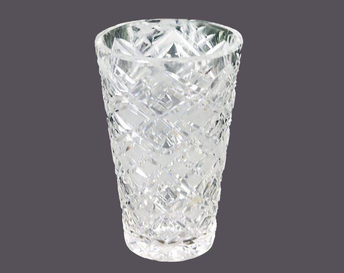 Heavy diamond-cut glass flower vase.