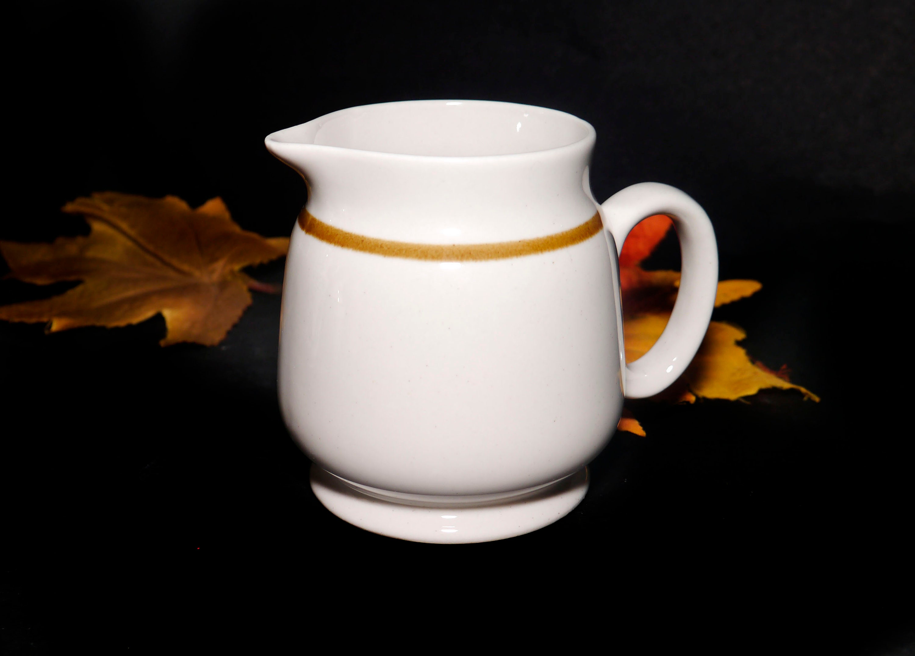 Genuine Stoneware Japan creamer or milk jug made by Mountain Wood