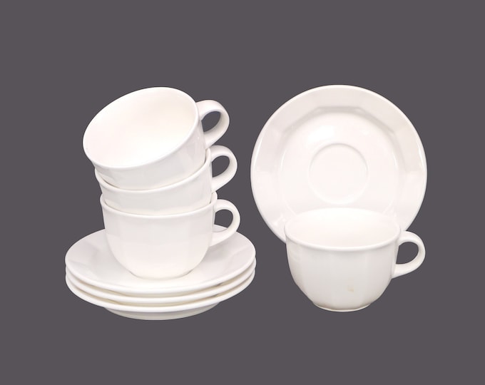 Four Villeroy & Boch Geo cup and saucer sets made in Luxembourg. All-white restaurantware.