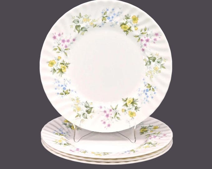 Four Minton Spring Valley large dinner plates. Bone china made in England.