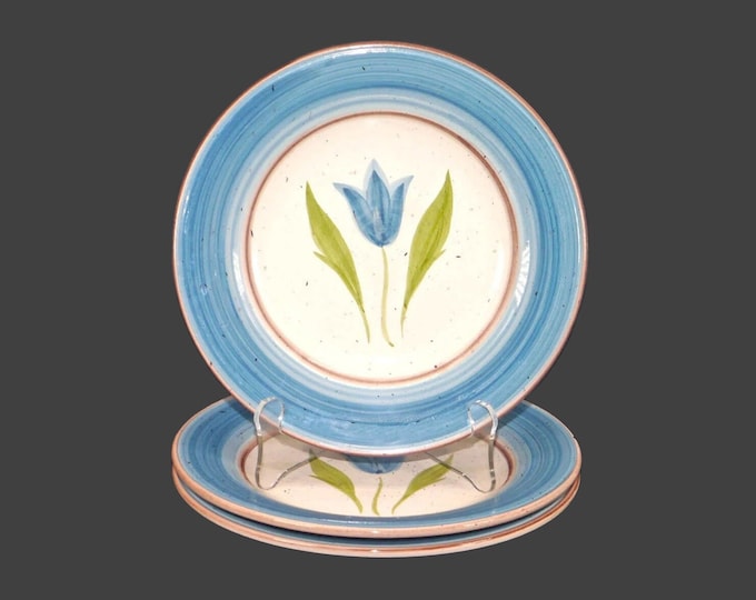 Three Faria & Bento stoneware salad plates. Blue tulips made in Portugal.