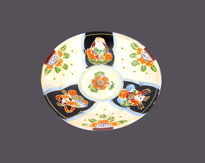 Hand-painted Katuni moriage plate. Winged Buddah, consorts, orange and white florals. Made in Japan.