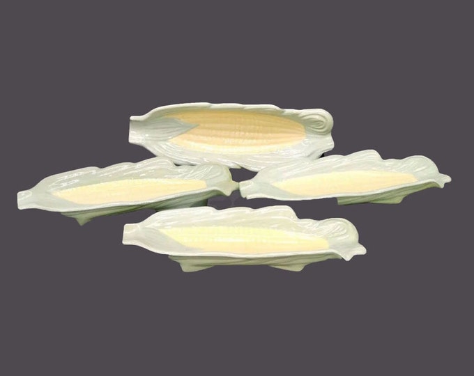 Four corn on the cob plates. Green with yellow corn kernels. Handmade, marked Ruth.