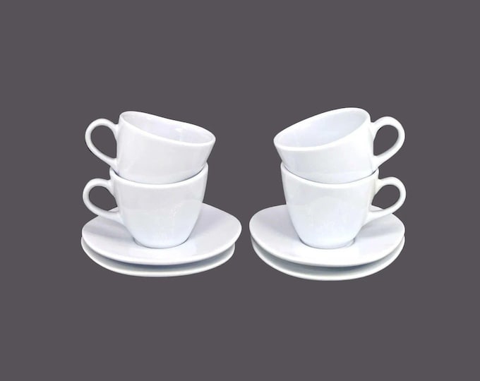 Four MiqueDesign | Mique Sweden cup and saucer sets. Robin's egg blue, asymmetrical shape made in Portugal by SOFAL