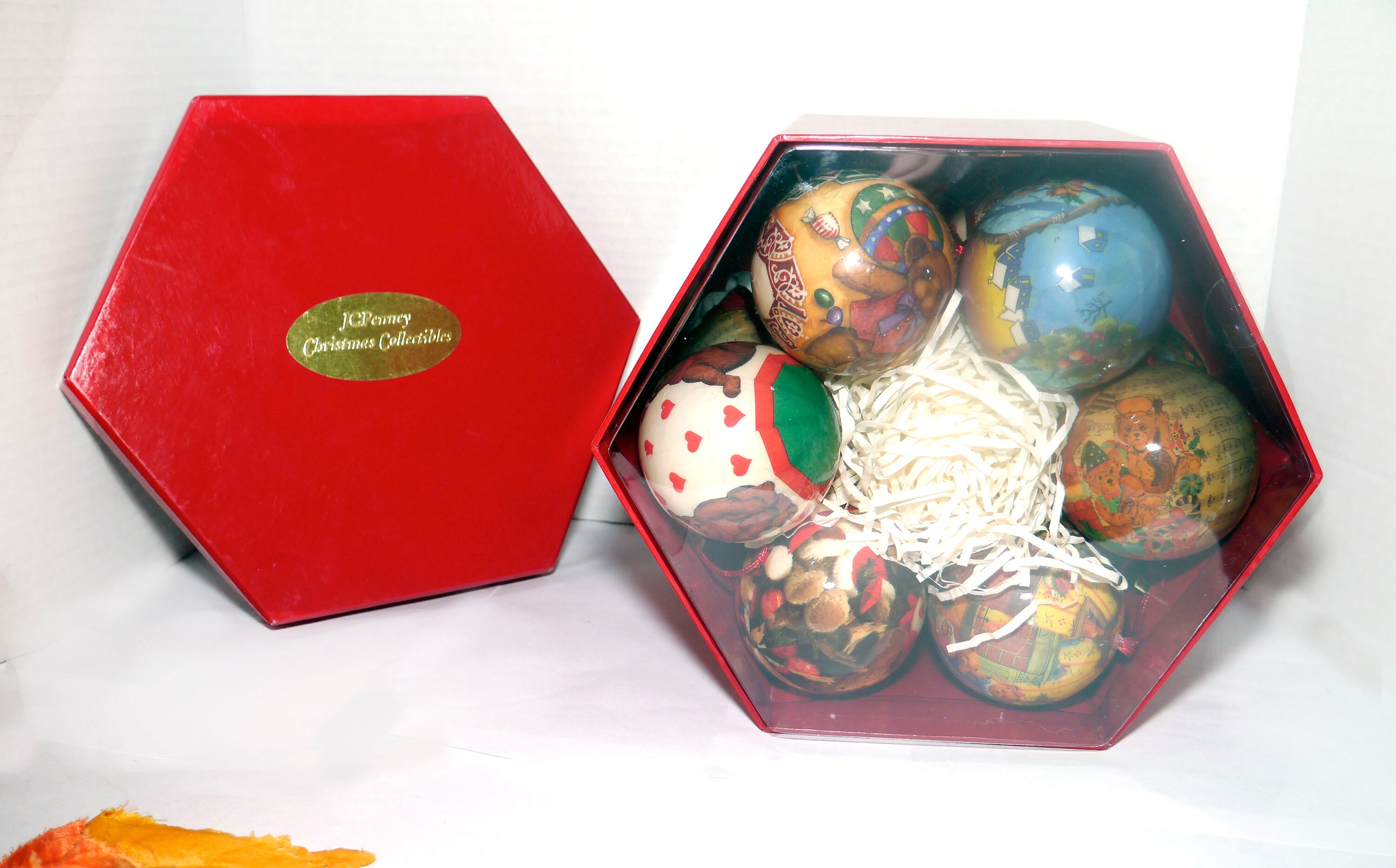 Twelve boxed JC Penney Paper Mache Paper Ball Christmas tree