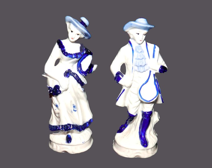 Pair of mid-century Dresden-like figurines. Courting Couple man and woman in period Victorian dress. Attributed Taiwan 1950s to 1960.