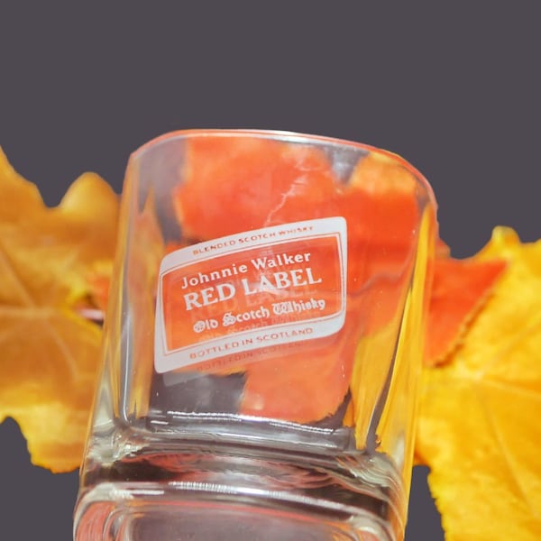 Johnnie Walker Red Label lo-ball | scotch whisky | on-the-rocks | old fashioned glass. Etched-glass branding.