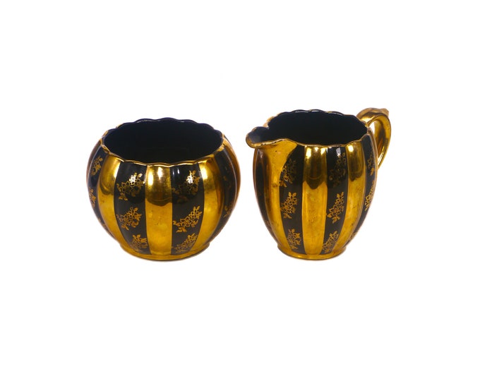 Early mid-century Gibsons England J309 creamer and open sugar bowl set made in England. Gold and black panels, gold flowers.