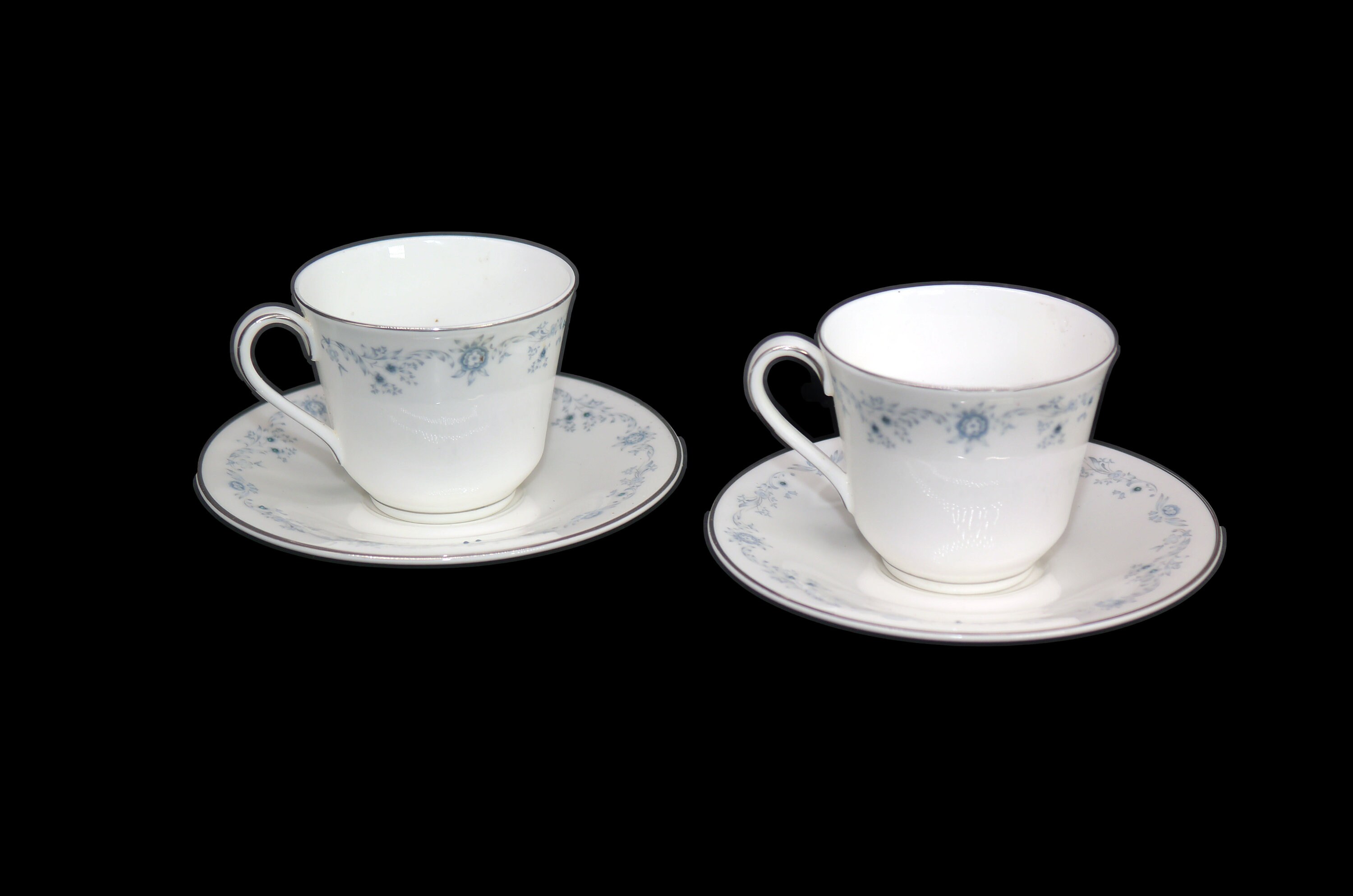 Pair of Royal Doulton Angelique H4997 cup and saucer sets made in England.