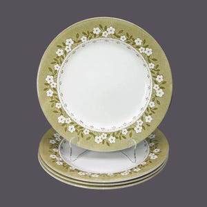 Four J&G Meakin Mayflower dinner plates made in England. Minor flaw (see below).