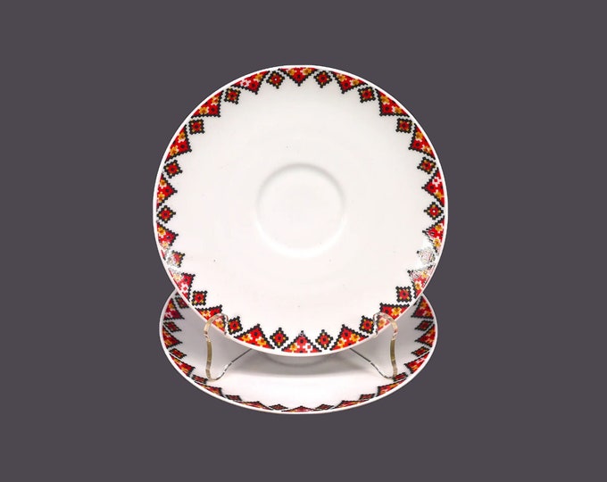 Pair of Rosenthal Raymond Loewy designed orphaned saucers only in a traditional Ukranian motif made in Germany.