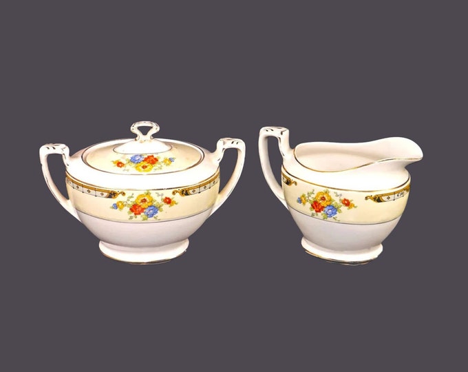 Art-deco era Alfred Meakin Celia creamer and covered sugar bowl set made in England. Flaws (see below). Hard to find.