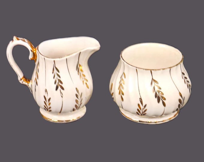 Sadler 2954 hand-decorated creamer and open sugar bowl made in England.