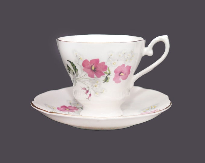 Royal Grafton bone china cup and saucer set made in England. Pink, white, yellow florals, gold edge and accents.