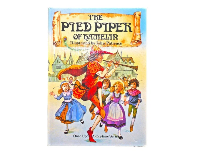 The Pied Piper of Hamelin hardcover book. Published Peter Haddock UK. John Patience illustrations. Printed in Italy.