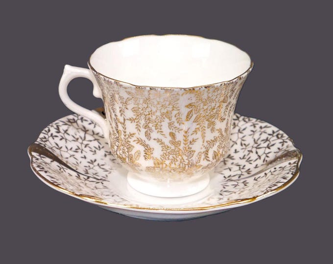 Mismatched gold chintz tea set of Royal Vale cup with Queen Anne saucer. Bone china made in England.