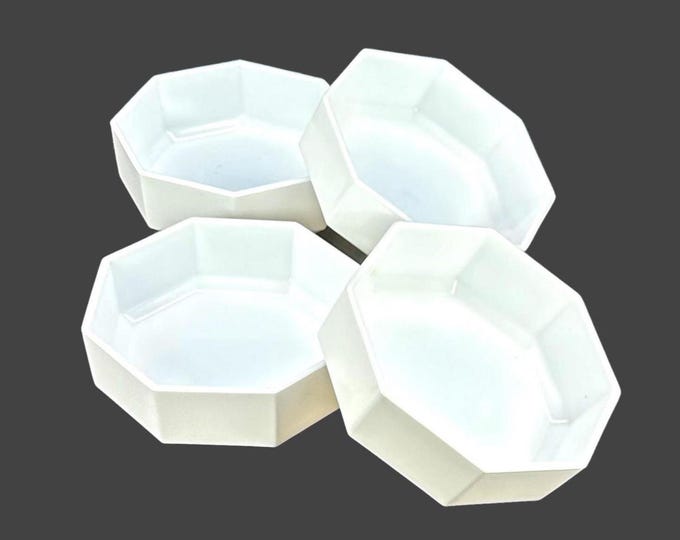 Four Arcopal Novoctime White multi-sided Chef's favorite all-white cereal bowls made in France. Soft edge, eight-sided.