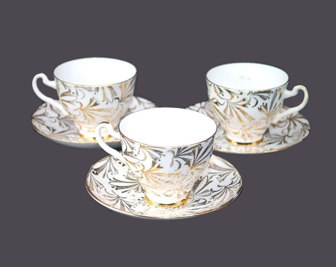 Three Imperial Fine China gold floral chintz tea sets made in England.