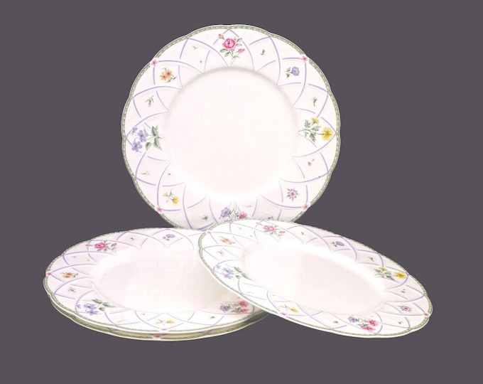 Four Mikasa Spring Prose A8010 large, bone china dinner plates. Flaw (see below).