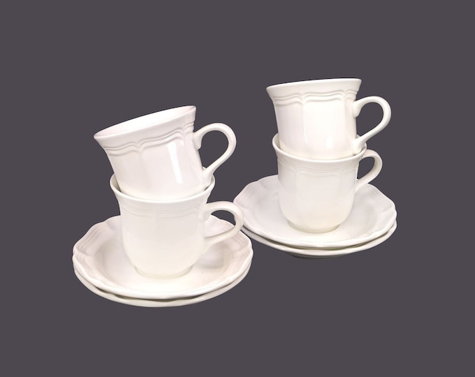 Four Mikasa French Countryside F9000 stoneware cup and saucer sets. Chef's favoritre all-white tableware.