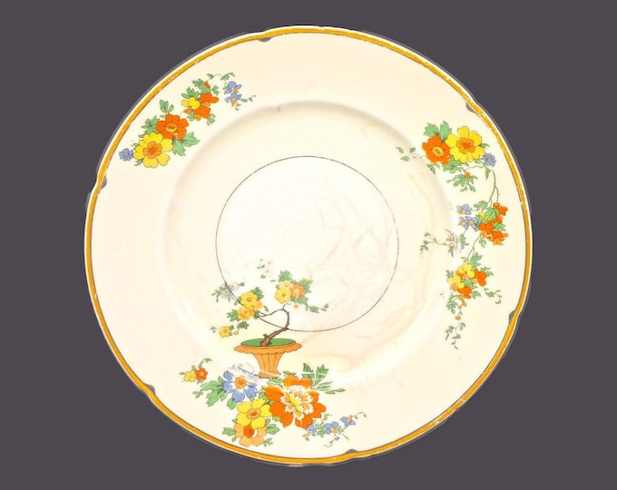 Antique Edwardian Age Grindley Carnival luncheon plate. Flowers in urn. Ivory Ware made in England. Flaws (see below).