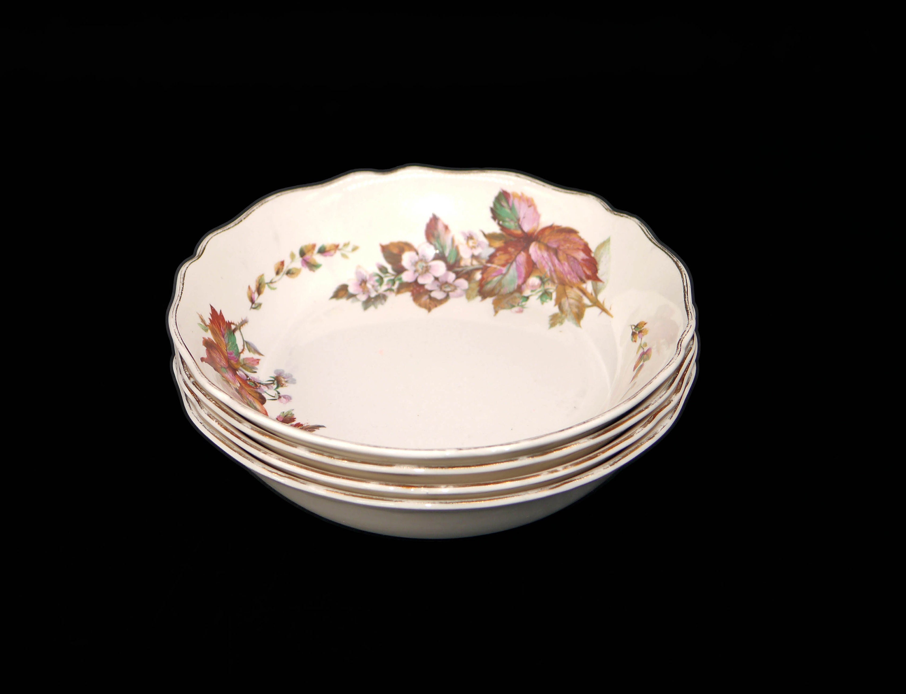 Four Royal Doulton D6226 Wilton soup bowls made in England.