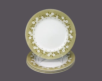 Four J&G Meakin Mayflower dinner plates made in England. Minor flaw (see below).