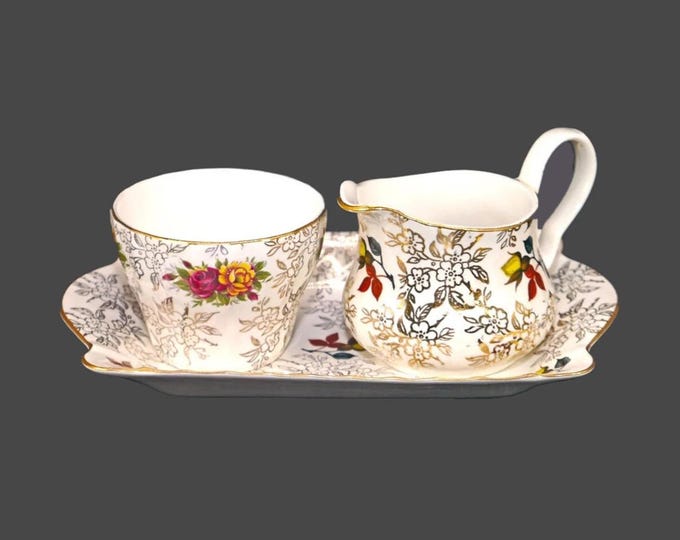 Herbert Aynsley gold floral chintz tableware: creamer, sugar bowl and under-tray made in England.