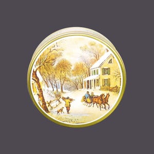 Vintage Currier & Ives American Homestead Winter round cookie or biscuit tin.