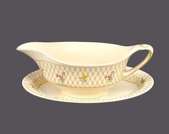 Antique Johnson Brothers Old English Trellis gravy boat with underplate made England.