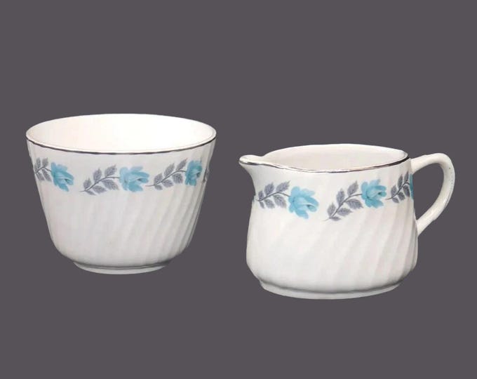 Barratts creamer and open sugar bowl set made in England. Blue roses.