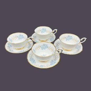 Four Tuscan China Avondale F163 bone china cup and saucer sets made in England.