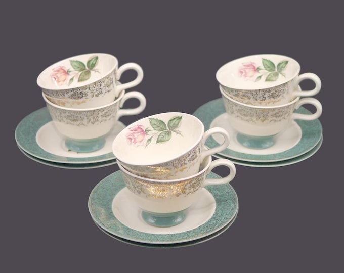 Six Homer Laughlin Margaret Rose Green cup and saucer sets made in the USA. Flaw (see below).