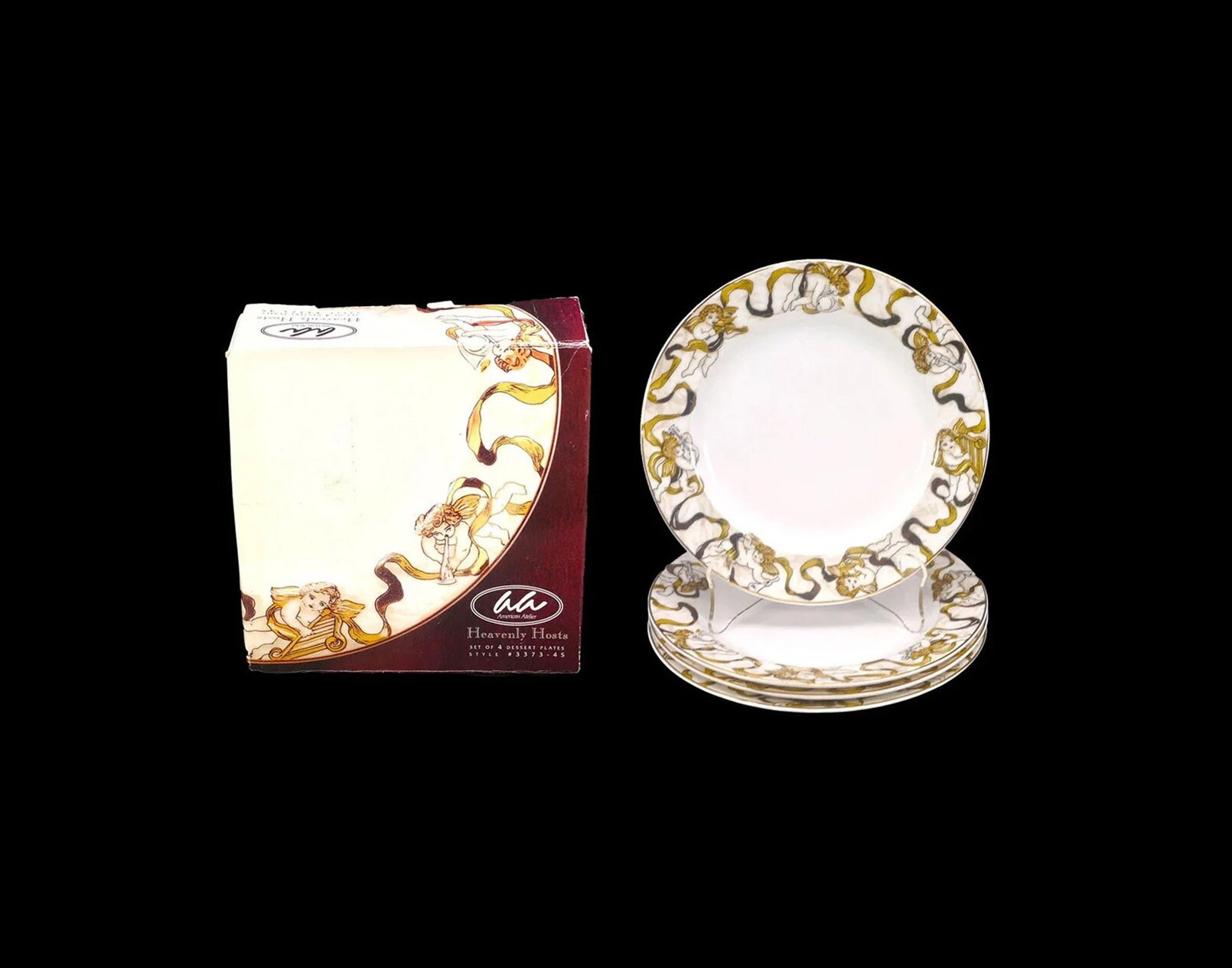 Four American Atelier Heavenly Host salad plates. Unused in box.