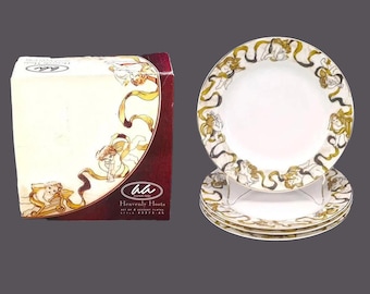 Four American Atelier Heavenly Host salad plates. Unused in box.