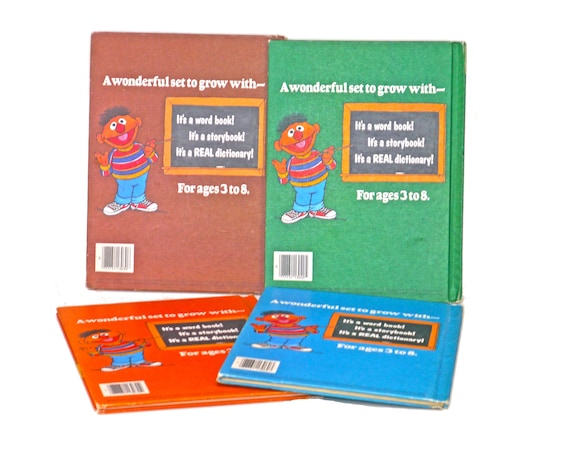 Four Volumes of Big Bird's Sesame Street Dictionary Volumes