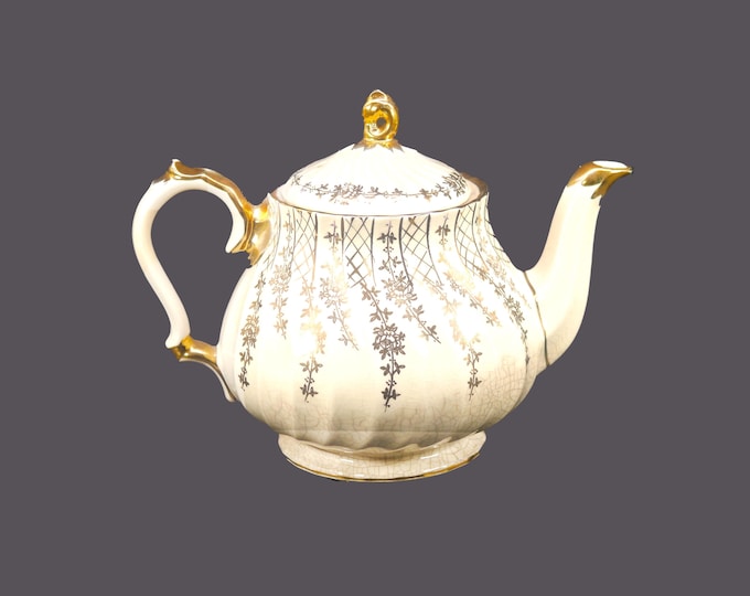 Early mid-century Sadler 3046 four-cup teapot with lid. Gold leaves, flowers, lattice. Made in England.