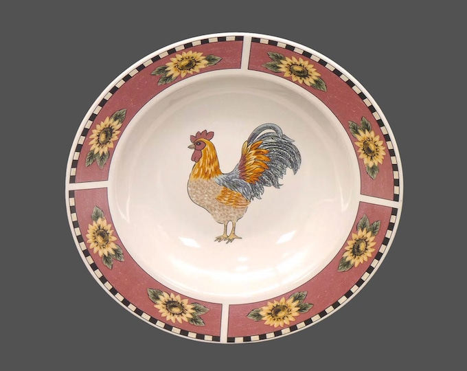Gibson Brewster rimmed soup bowl. Central rooster, sunflower rim. Sold individually.