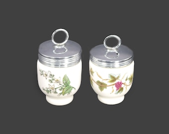 Pair of Royal Worcester porcelain egg coddlers. Valencia and Bacchanal. Made in England.