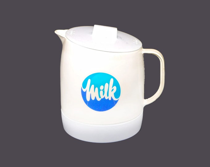 Quikut Dairy Farmers of Ontario plastic Milk jug with lid made in USA.